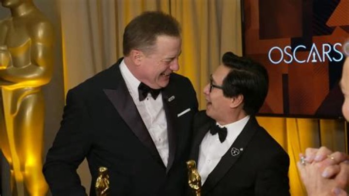 Actress who won a Best Actress Oscar for playing a TV programming chief in Network: 2 wds.