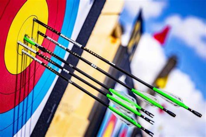 ___ and arrow target sport equipment with which one aims at 17a