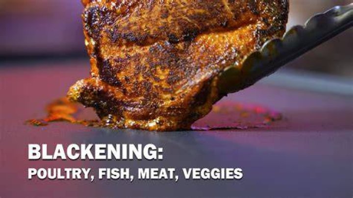 Blacken as a piece of meat