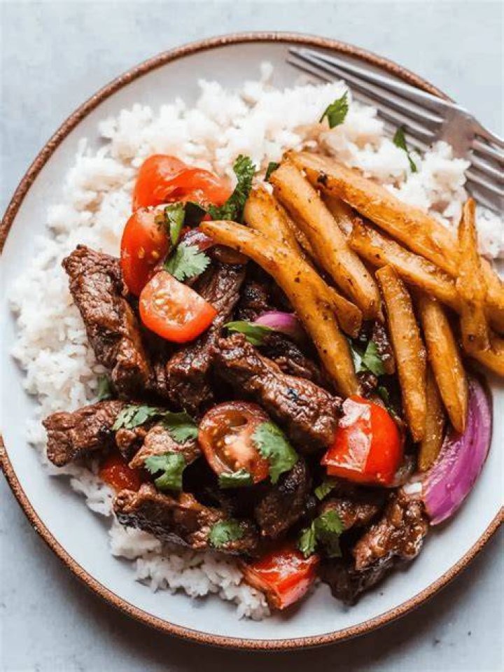 ___ saltado (stir-fried dish with sliced beef) Crossword Clue NYT