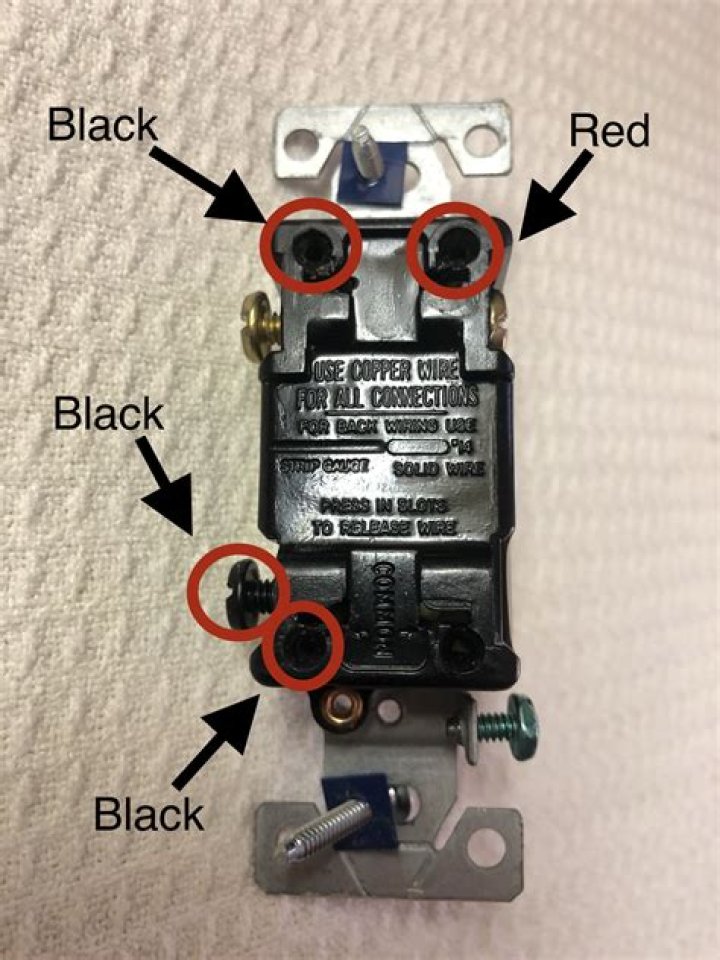 What does black screw on 3 way switch mean?