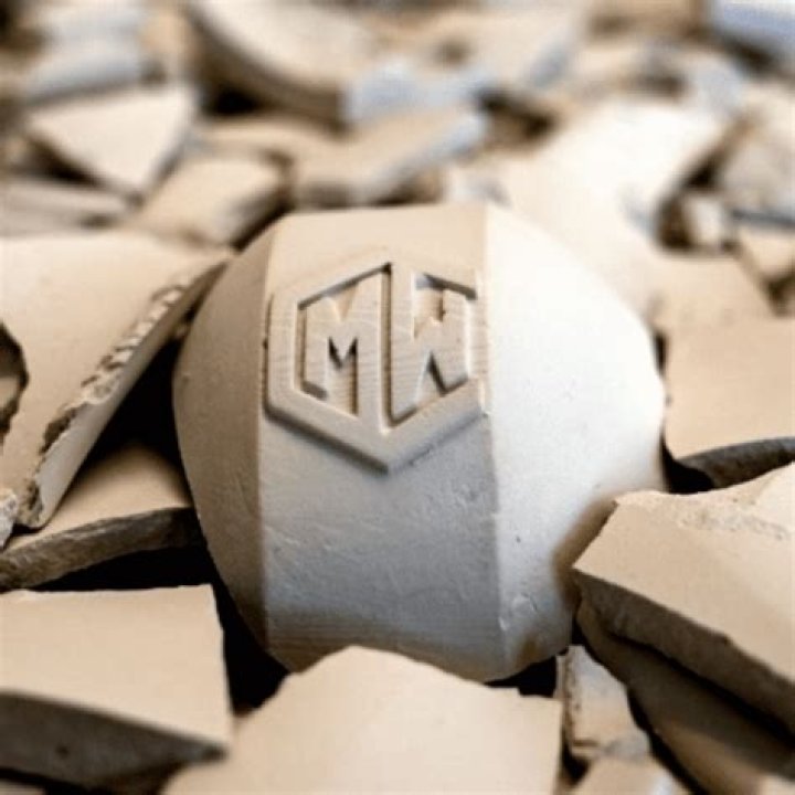 What does vinegar do to clay?
