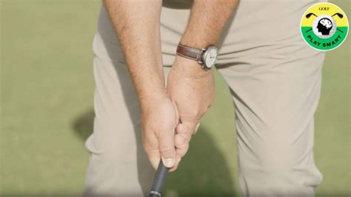 What is the proper grip on a golf club?
