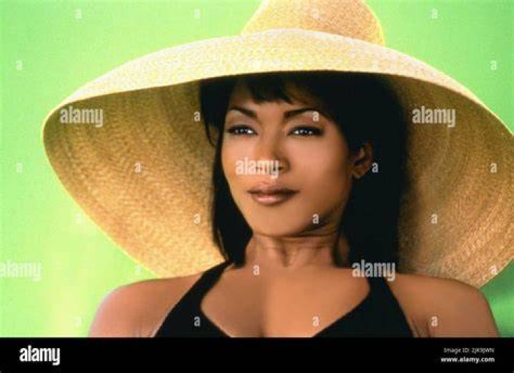 With 32-Across 1998 Angela Bassett film based on a best-selling book: 3 wds.